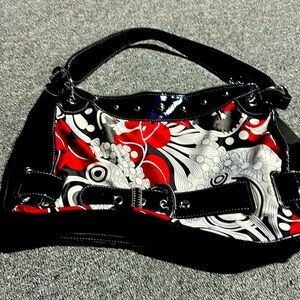 Kathy Van Zee-land 15 inches length 11 1/2 inches height 3 inches wide.